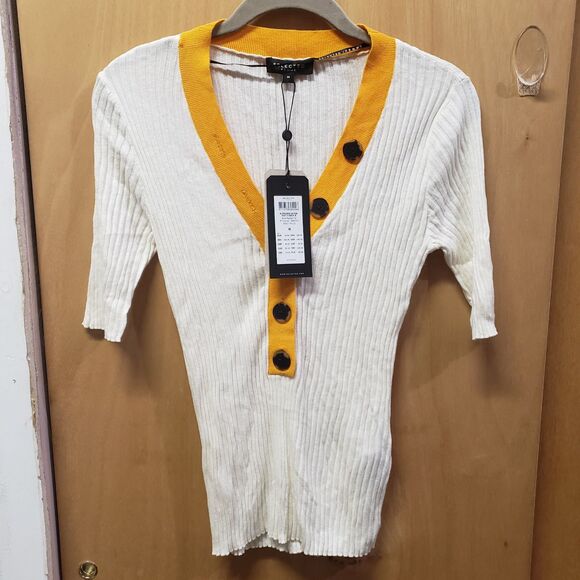 NWT
Selected Femme knitted button through polo
cardigan in sand/marigold
Sz Med - Picture 1 of 5
